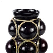 Vase en verre noir soufflé à la main entouré d'une structure en laiton 104-Enlace Spheres