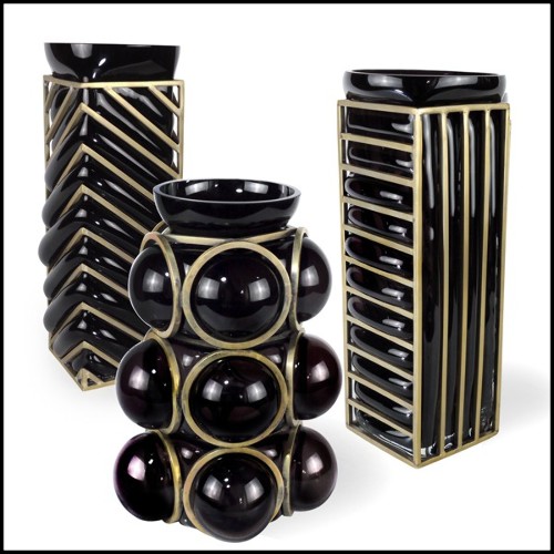 Vase with handblown black glass surrounded by a brass structure 104-Enlace Spheres