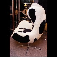 Armchair upholstered with treated natural cowhide on swivel polished stainless steel feet PC-Cowhide Egg