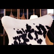 Armchair upholstered with treated natural cowhide on swivel polished stainless steel feet PC-Cowhide Egg