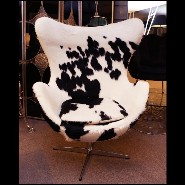 Armchair upholstered with treated natural cowhide on swivel polished stainless steel feet PC-Cowhide Egg