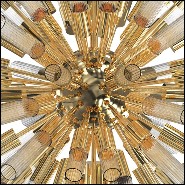 Suspension with ribbed crystal glass tubes held by a gold plated polished brass structure 164-Fall Sputnik