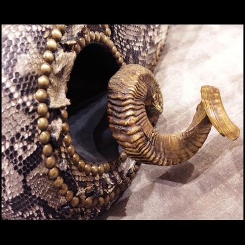 Chair with structure in solid beech wood covered with natural python skin PC-Python Medium