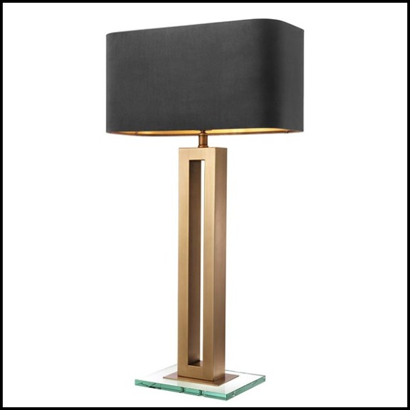 Table lamp with structure in antique brass finish and clear glass base 24-Gap