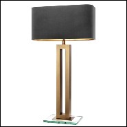 Table lamp with structure in antique brass finish and clear glass base 24-Gap