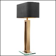 Table lamp with structure in antique brass finish and clear glass base 24-Gap