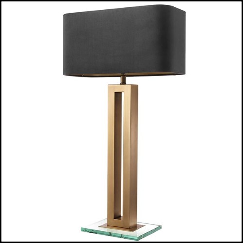 Table lamp with structure in antique brass finish and clear glass base 24-Gap