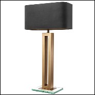 Table lamp with structure in antique brass finish and clear glass base 24-Gap