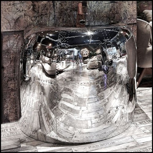 Reception desk made with a Beechcraft 18 air inlet 22-Beechcraft 18