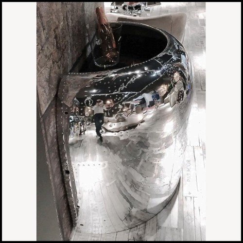 Reception desk made with a Beechcraft 18 air inlet 22-Beechcraft 18