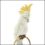 Sculpture in hand painted white porcelain with brass details 162-Parrot on Ring.