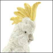 Sculpture in hand painted white porcelain with brass details 162-Parrot on Ring.