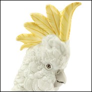 Sculpture in hand painted white porcelain with brass details 162-Parrot on Ring.