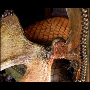 Fauteuil avec peau de piraruku et avec bois de rennes et queue de girafe PC-Piraruku