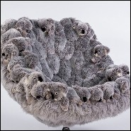 Fauteuil avec de petites peluches de koalas sur le dossier PC-Koala