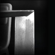 Table with raw steel structure in dark finish with colorless varnished finish 147-Acier black deep