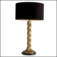 Lampe Costanza en finiiton laiton et base et granite noir.
