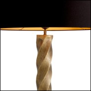 Detail of the vintage brass finish foot of the Costanza floor lamp