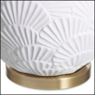 Detail of the base of the Andorra lamp in antique brass