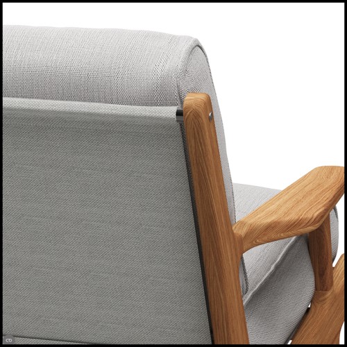 Details of the teak, outdoor fabric and sling back ferrari of the armchair gloster, Bay Lounge collection